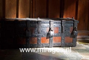 Big wooden chest with iron locks in Winchester cathedral. England, UK.