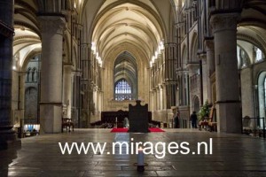 Burning a candle at Cantebury Cathedral, Canterbury, England, UK.